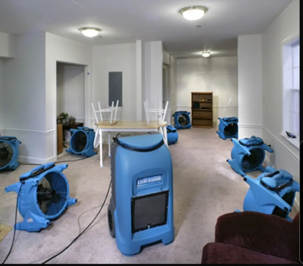 Air movers and dehumidifier setup for Water Extraction & Removal in Gentry